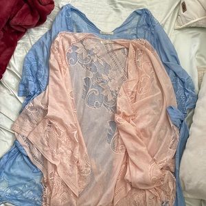 Two coverups. They come together, one in a sky blue and one in baby pink